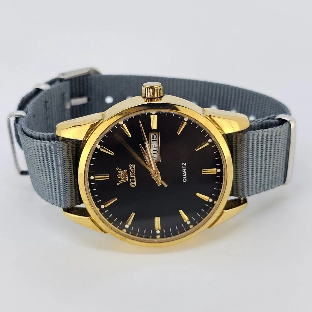 Men's Analog Watch 38MM Black Dial Day Date NEW Gray Canvas Band NEW Battery